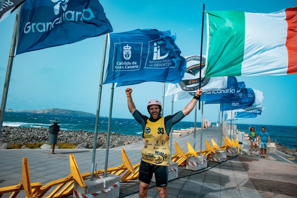 Francesco Cappuzzo celebrating on the GWA Wingfoil World Tour